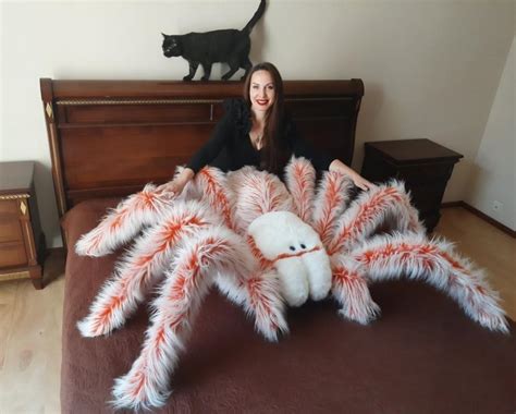 The legs of these cozy monsters are made with flexible metal wires. . Giant tarantula pillow